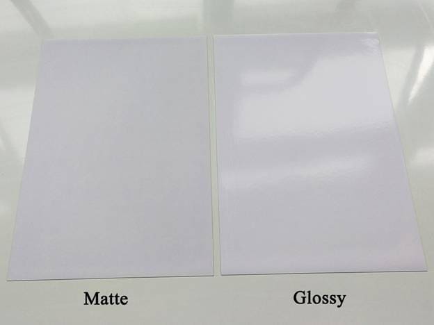 Matte and glossy paper samples for high-quality business cards and stationery from Starlite Paper & Cards.