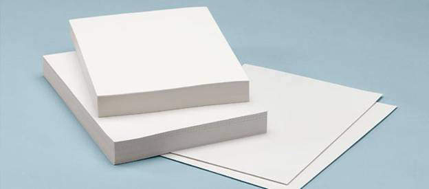 Blank white paper and card stock for printing and crafting, ideal for custom stationery and professional projects.
